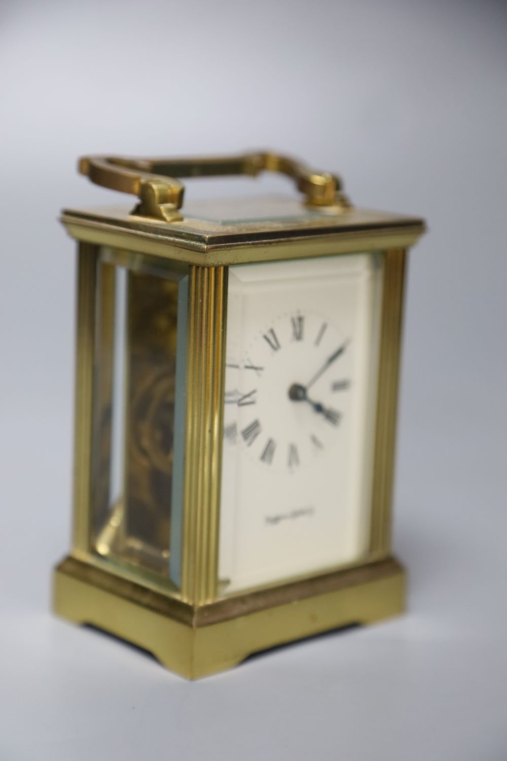 A lacquered brass carriage timepiece, retailed by Mappin & Webb